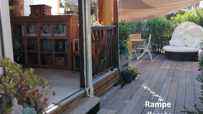 Accès terrasse par rampe d'accès pour fauteuil roulant